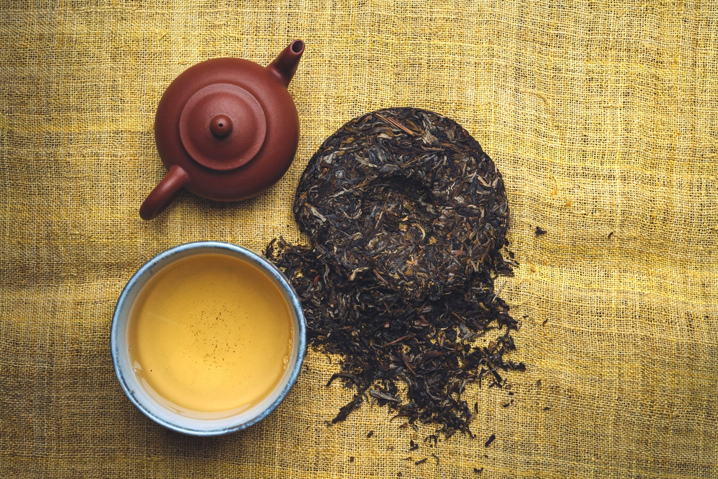 100g tea cake - 2019 first grade raw (Sheng) pu-erh teacake from Jingmai. Hand-picked during Springtime in Jingmai this tea is among the most famous in Yunnan, China. Traditionally withered, cooked, hand-rolled, sun-dried and stone-pressed. Flavour profile: Honey, orchid